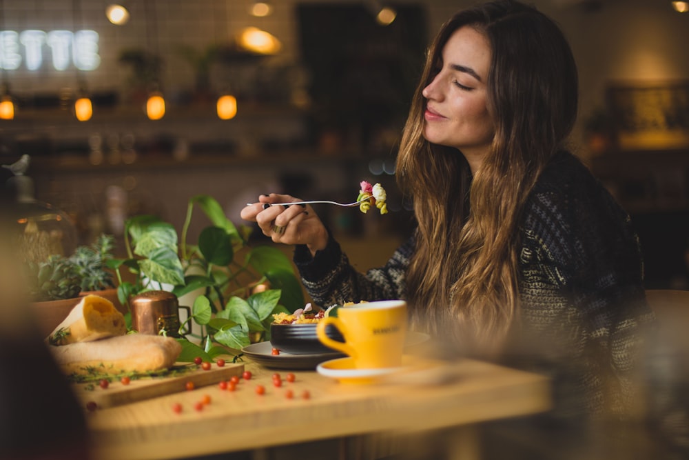 a woman enjoying a meal